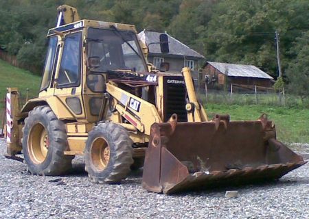 Buldoexcavator Caterpilar Buldoexcavator Caterpilar