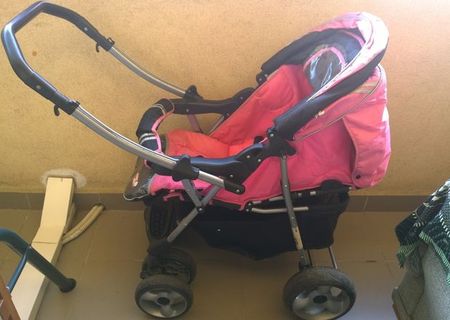 Carucior copii roz "PRIMII PASI" cu suspensii la roti