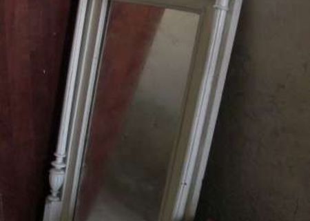 Oglinda venetiana de cristal si rama din lemn lucrat
