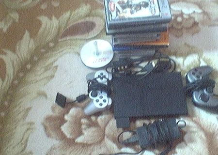 playstation2 de vanzare/sau schimb cu papagali