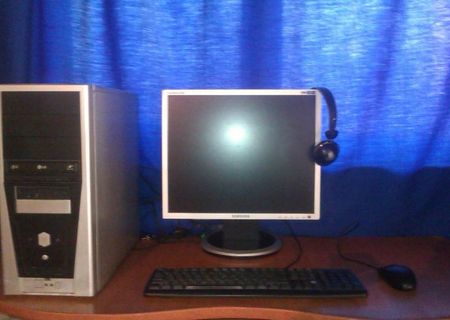 Sistem desktop cu monitor ( samsung )+tastatura+mouse+casti ( procesor 1.8 ghz , ram 1,5 gb, hdd 160, video 256 mb )