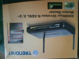 and Router TRENDnet 300Mbps Wireless N ADSL 2/2+ Modem Router . Nou!
