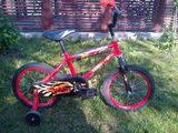 Bicicleta initiere copii