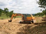 Excavator in stare de functionare foarte buna