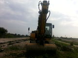 vand excavator cu senile