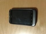 vand HTC Wildfire S + husa de piele...codat pe Orange