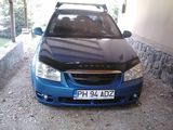 Vand  sau schimb ..Kia Cerato